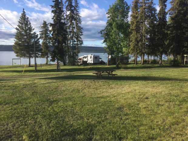 An RV on the waterfront at the Woodlands Fishin Resort in Chilanko Forks.