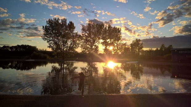 The sun hitting the lake at 0 Mile RV Park in Dawson Creek.